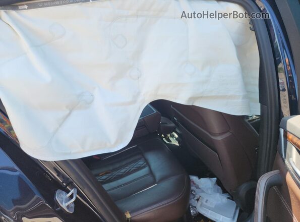 WBAJE7C58JWC56570 2018 BMW 5 SERIES Black Rear seats view