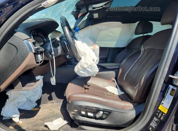 WBAJE7C58JWC56570 2018 BMW 5 SERIES Black Front interior view