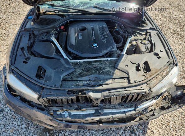 WBAJE7C58JWC56570 2018 BMW 5 SERIES Black Rear interior view