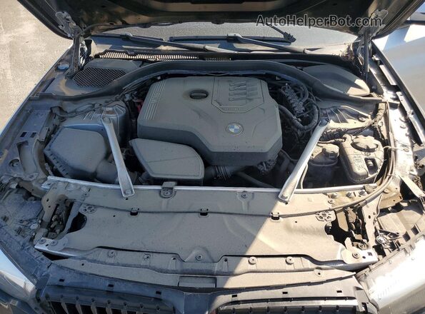 WBAJR7C05LWW65201 2020 BMW 5 SERIES Silver Вид задньої частини салону