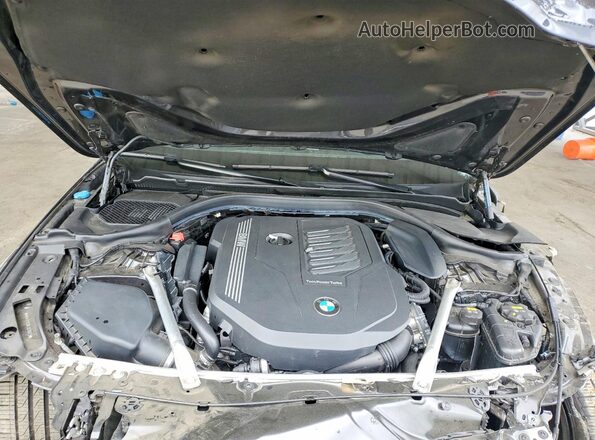 WBAJS1C06LCD78973 2020 BMW 5 SERIES Charcoal Rear interior view