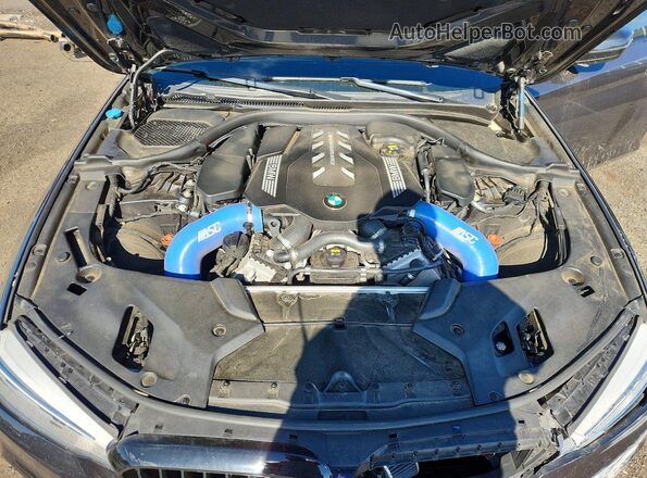 WBAJS7C02LCE14810 2020 BMW M5 Silver Widok wnętrza z tyłu