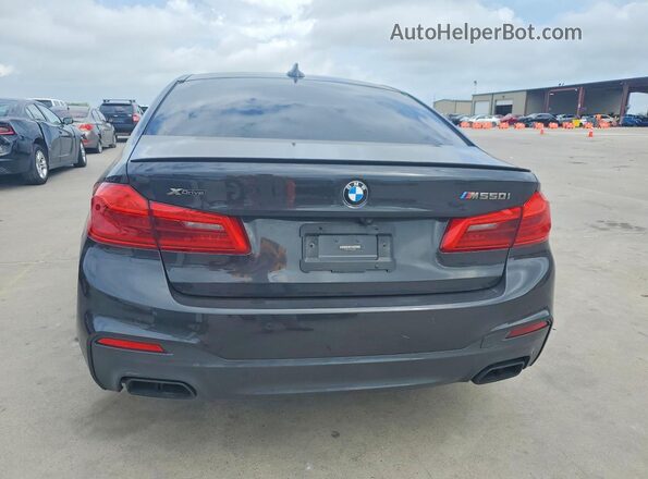 WBAJS7C04LCD45960 2020 BMW M5 Charcoal Հետևի տեսք