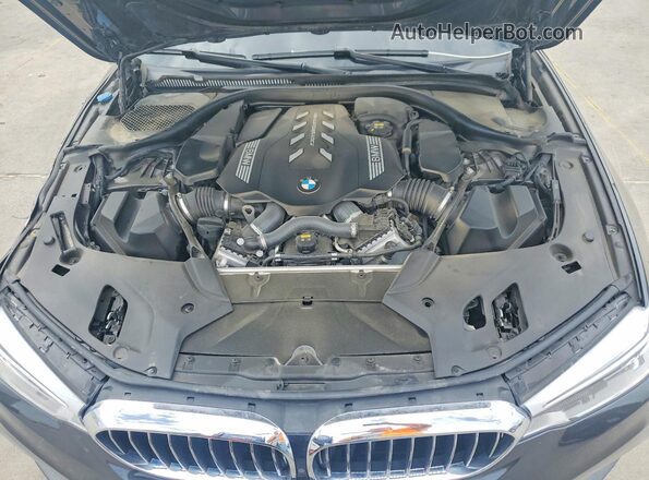 WBAJS7C04LCD45960 2020 BMW M5 Charcoal Սալոնի հետևի տեսք