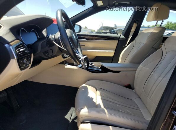 WBAJV6C54JBK07879 2018 BMW 6 SERIES Brown Front interior view