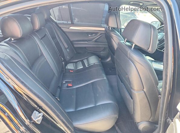 WBAKP9C56GD980933 2016 BMW 5 SERIES Black Vista de los asientos traseros