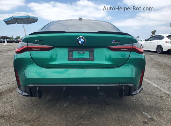 WBS43AZ09RCP75094 2024 BMW M4 Зеленый Вид сзади