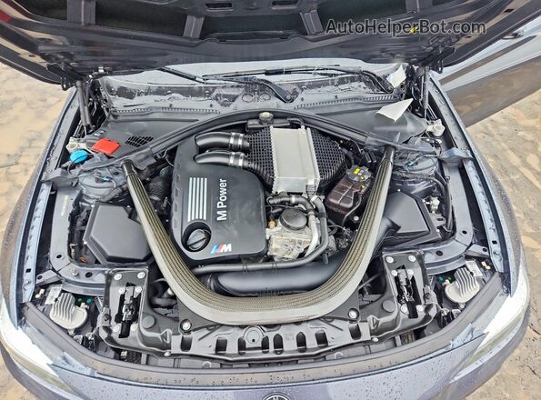 WBS4Z9C58JED22128 2018 BMW M4 Gray Vista interior trasera