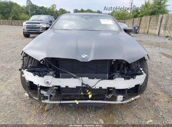 WBS83FK00TCU95645 2026 BMW M5 Black Вид задньої частини салону