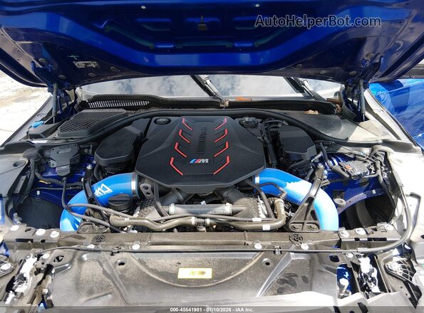 WBS83FK06SCT09928 2025 BMW M5 Blue Widok z tyłu