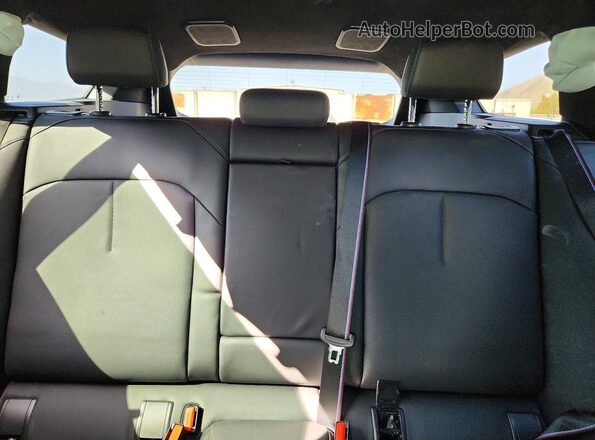 WBS83GV09TCX03202 2026 BMW M5 Green Rear seats view
