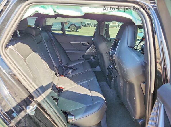 WBS83GV09TCX03202 2026 BMW M5 Green Rear interior view