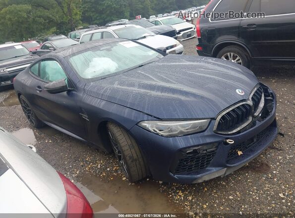 WBSAE0C05PCL11992 2023 BMW M8 Blue Вид задньої частини салону