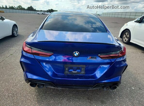 WBSGV0C0XNCH03263 2022 BMW M8 Синий Вид сзади