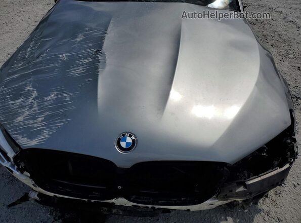 WBSJF0C56JB283626 2018 BMW M5 Gray Սալոնի հետևի տեսք
