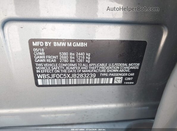 WBSJF0C5XJB283239 2018 BMW M5 Tan Vista del compartimento del motor