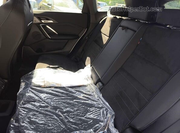 WBX13EF09T5562392 2026 BMW X1 White Vista interior trasera