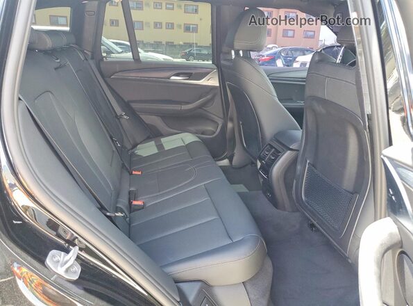 WBX47DP08RN302486 2024 BMW X3 Black Widok tylnych siedzeń
