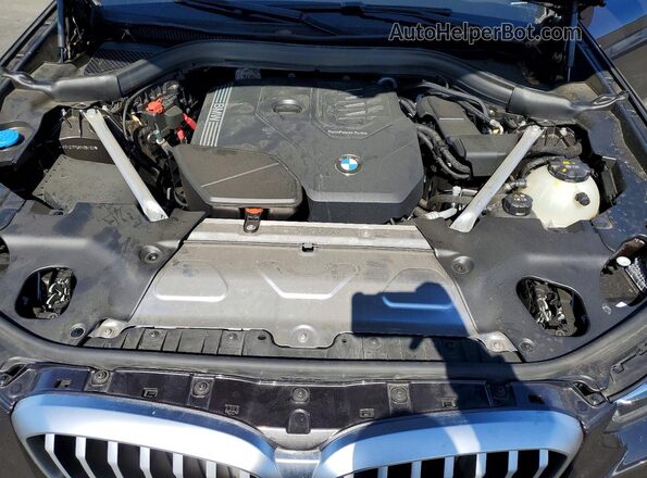 WBX57DP06RN261103 2024 BMW X3 Charcoal Widok wnętrza z tyłu