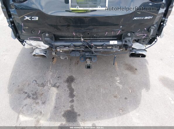 WBX57DP09NN173141 2022 BMW X3 Black Front view