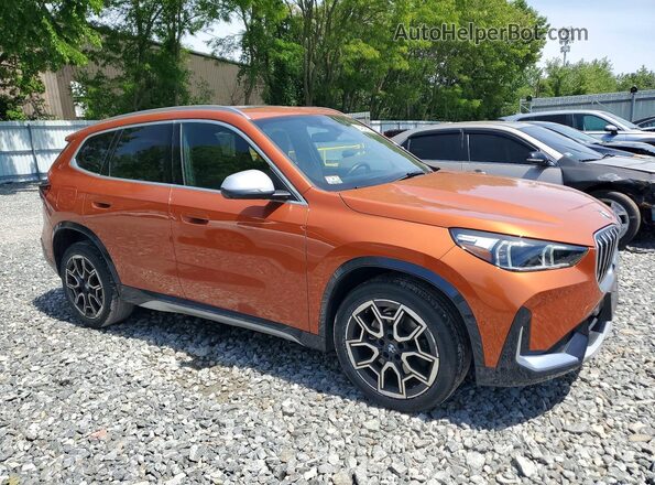 WBX73EF00P5Y10870 2023 BMW X1 Оранжевый Передняя правая четверть