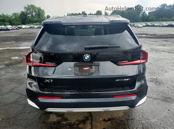 WBX73EF01P5W55813 2023 BMW X1 Black Вид ззаду
