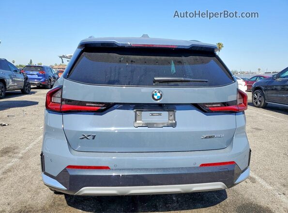 WBX73EF03R5Z15339 2024 BMW X1 Blue Հետևի տեսք