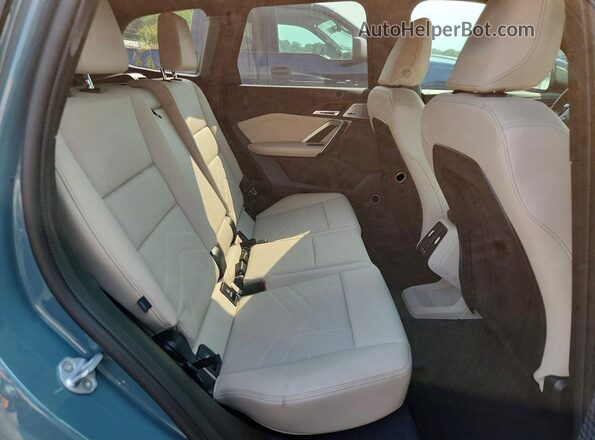 WBX73EF05S5189389 2025 BMW X1 Teal Սալոնի հետևի տեսք