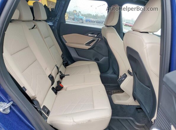 WBX73EF06R5Y41558 2024 BMW X1 Blue Вид задньої частини салону