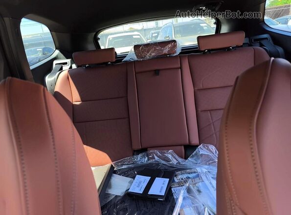 WBX73EF06T5599183 2026 BMW X1 Black Vista interior trasera