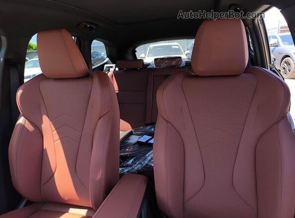 WBX73EF06T5599183 2026 BMW X1 Black Vista de los asientos traseros