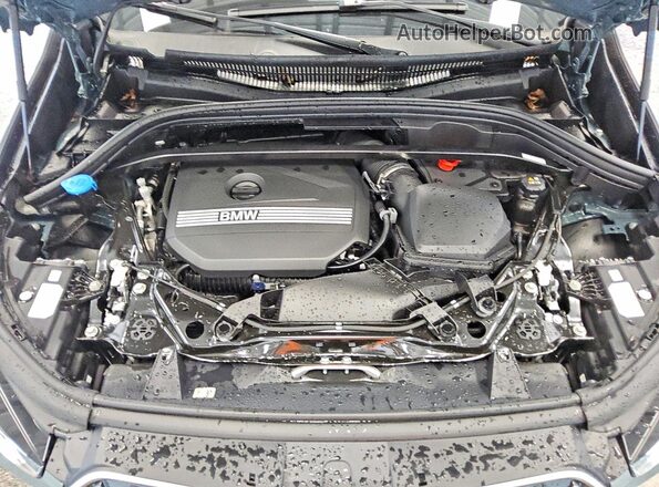 WBX73EF07R5Z36601 2024 BMW X1 Teal Вид задньої частини салону