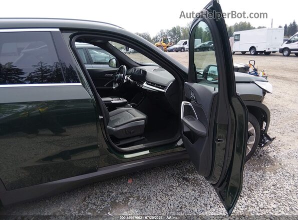 WBX73EF09P5W49337 2023 BMW X1 Green Front interior view