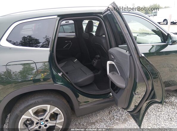 WBX73EF09P5W49337 2023 BMW X1 Green VIN sticker view