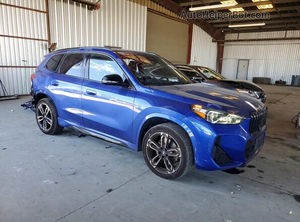 WBX73EF0XP5Y06910 2023 BMW X1 Blue Front right