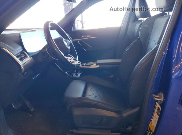 WBX73EF0XP5Y06910 2023 BMW X1 Blue Front interior view