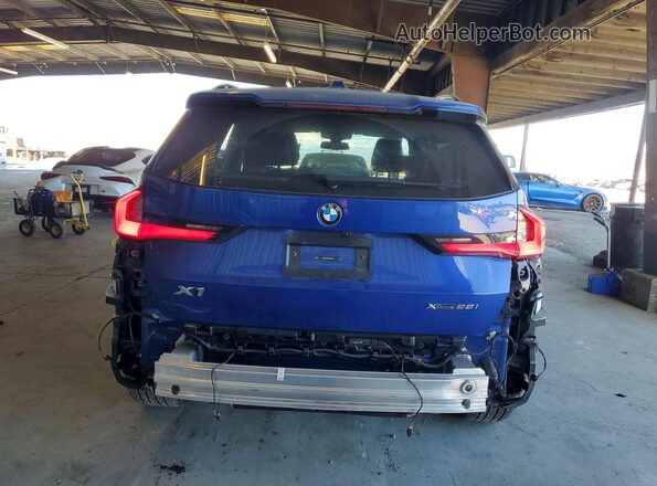 WBX73EF0XP5Y06910 2023 BMW X1 Blue Rear view