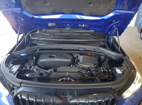 WBX73EF0XP5Y06910 2023 BMW X1 Blue Engine compartment view