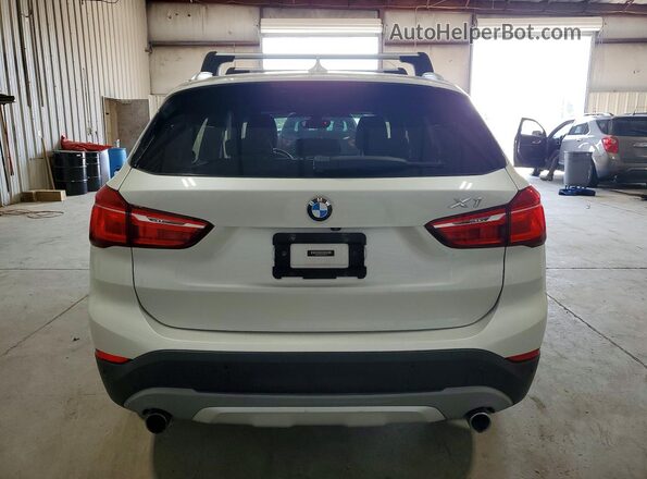 WBXHT3C30G5E52275 2016 BMW X1 White Vista trasera