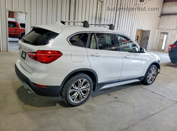 WBXHT3C30G5E52275 2016 BMW X1 White Trasero derecho