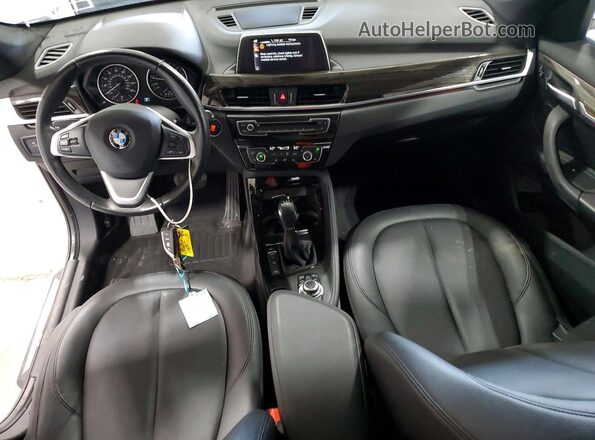 WBXHT3C30G5E52275 2016 BMW X1 White Vista del salpicadero