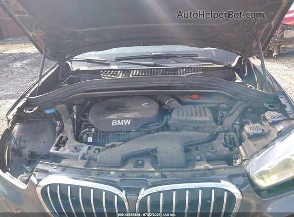 WBXHT3C30H5F73065 2017 BMW X1 Gray Rear view