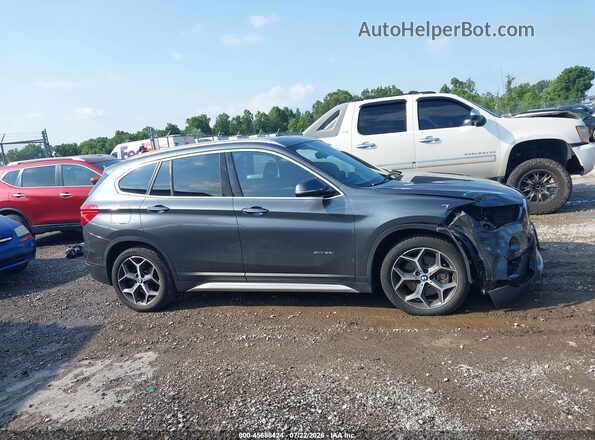 WBXHT3C30H5F73065 2017 BMW X1 Gray 360 interior view