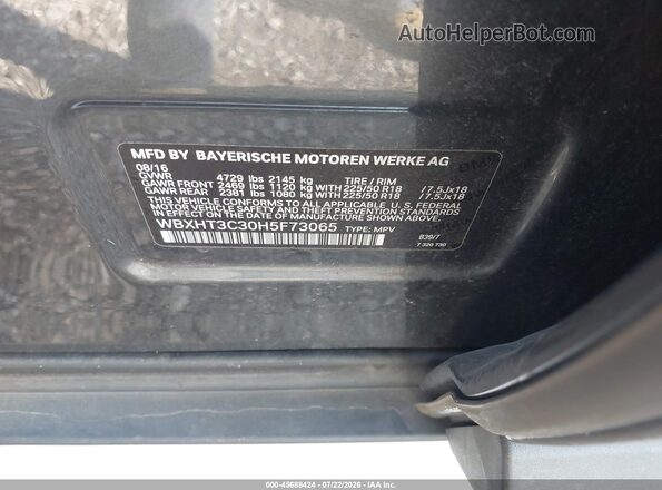 WBXHT3C30H5F73065 2017 BMW X1 Gray Engine compartment view