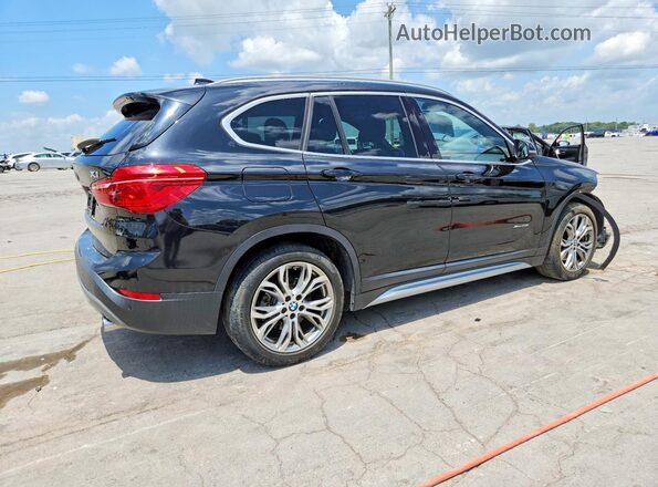 WBXHT3C30H5F80579 2017 BMW X1 Black Задня права чверть