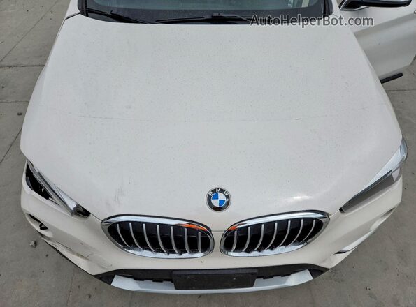 WBXHT3C30J3H31809 2018 BMW X1 White Սալոնի հետևի տեսք