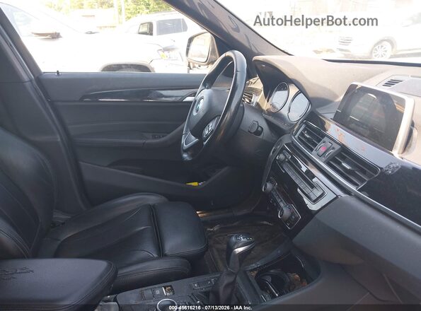WBXHT3C30J5L30682 2018 BMW X1 Black Front interior view