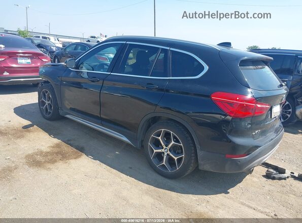 WBXHT3C30J5L30682 2018 BMW X1 Black Rear left