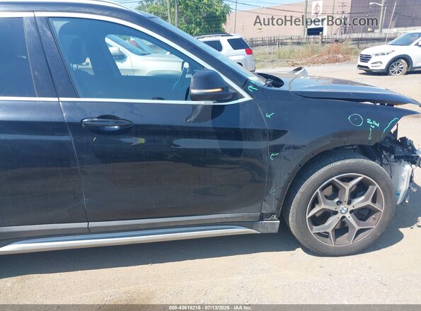 WBXHT3C30J5L30682 2018 BMW X1 Black Rear interior view