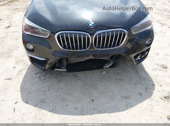 WBXHT3C31G5E55430 2016 BMW X1 Black წინა ხედი